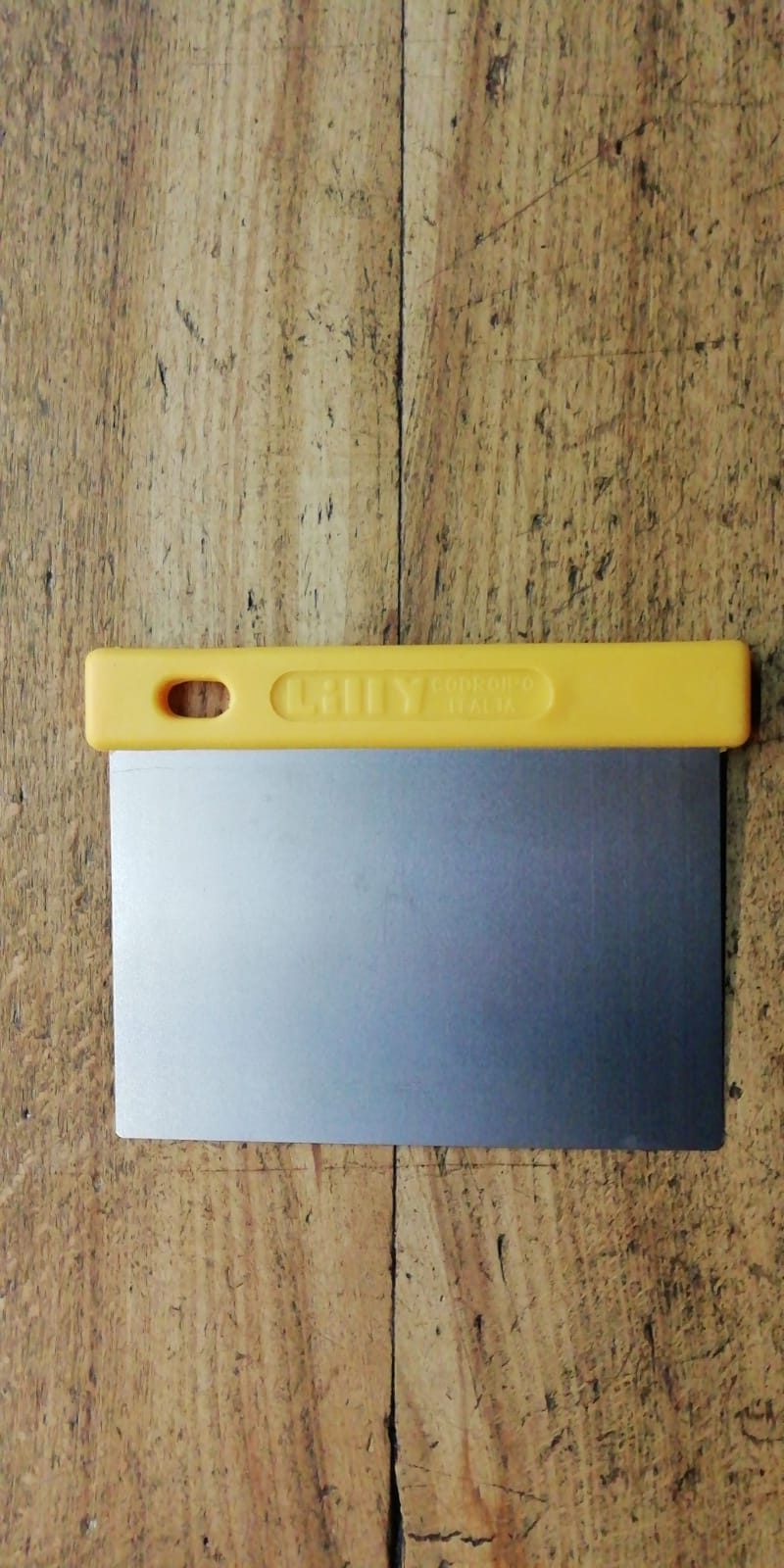 Cutting board scraper