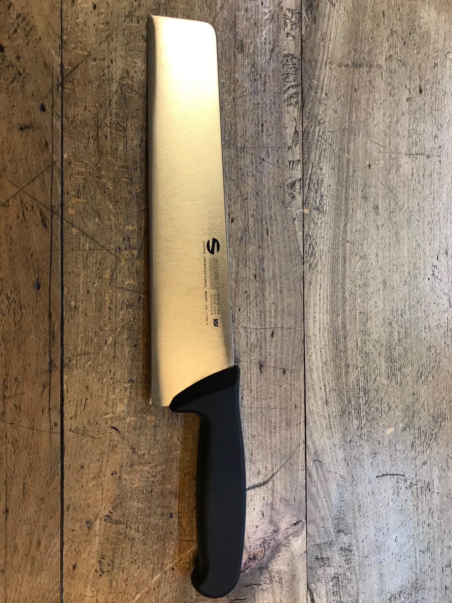 Coltello per la pasta con manico in plastica