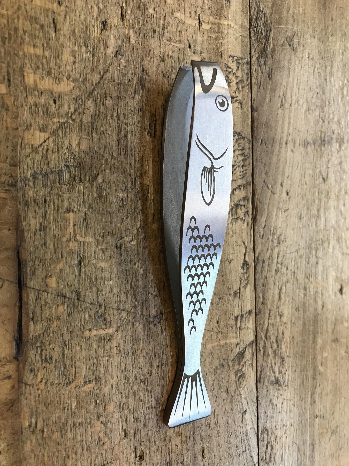 Pinza per deliscare il pesce