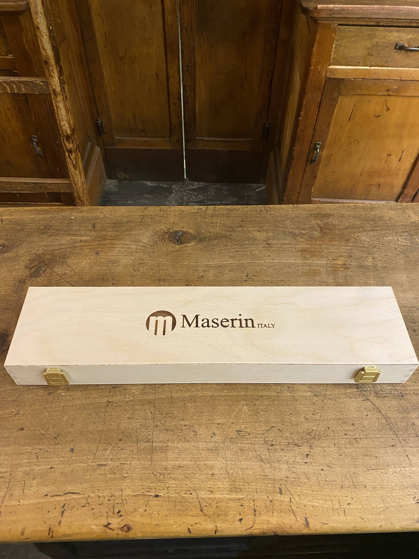 Sciabola per champagne con manico in ulivo